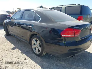2014 Volkswagen Passat Wolfsburg Edition with VIN 1VWAS7A30EC041800, listed as a IAAI auction lot 41769648 with 120,645 mi miles and . Bid and sale history available at DreamBid. Image 3.