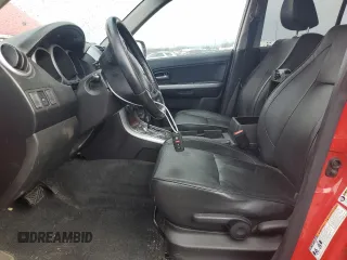 2008 Suzuki Grand Vitara Luxury z VIN JS3TD947084100425, wystawiony jako Copart lot #44932925 z przebiegiem 181 473 mil mil oraz Szkody całkowita. Historia ofert i sprzedaży dostępna na DreamBid. Obrazek 7.