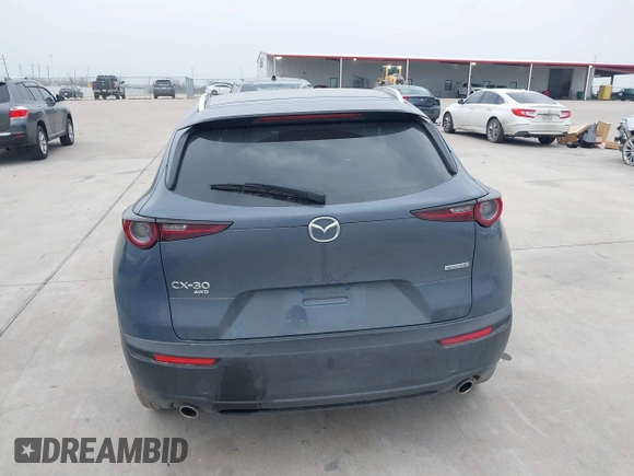 2023 Mazda CX-30 S Carbon Edition with VIN 3MVDMBCM0PM532449, listed as a IAAI auction lot 41799255 with 60,604 mi miles and . Bid and sale history available at DreamBid. Image 17.