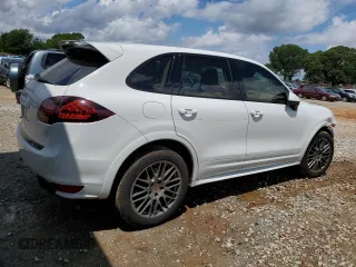 2014 Porsche Cayenne GTS с VIN WP1AD2A27ELA70118, выставлен на аукционе Copart как лот 56405945 с пробегом 179 529 миль миль и Списание • Salvage title. История ставок и продаж доступна на DreamBid. Изображение 3.