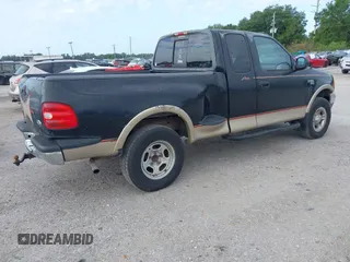 1999 Ford F-150 XL z VIN 1FTRX08L4XKB47888, wystawiony jako IAAI lot #42000396 z przebiegiem 200 461 mil mil oraz . Historia ofert i sprzedaży dostępna na DreamBid. Obrazek 4.