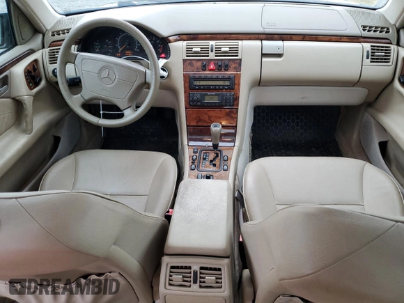 1999 Mercedes-Benz E-Class with VIN WDBJF65H9XA929577, listed as a Copart auction lot 71932364 with 84,806 mi miles and Salvage Title. Bid and sale history available at carsss.com. Image 8.