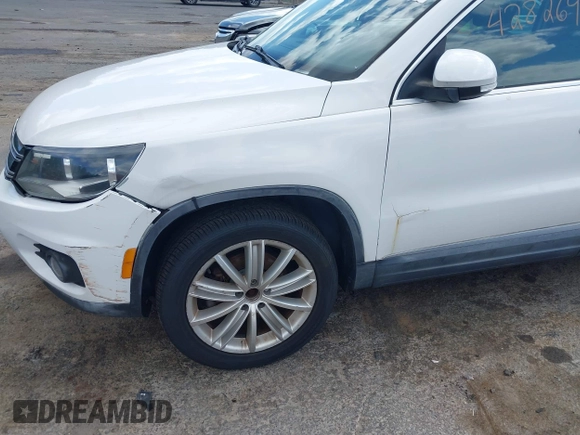2012 Volkswagen Tiguan S with VIN WVGAV7AX0CW566151, listed as a IAAI auction lot 42826985 with 121,185 mi miles and . Bid and sale history available at DreamBid. Image 6.