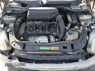 2009 MINI Hardtop S with VIN WMWMF73549TT94143, listed as a Copart auction lot 52120615 with 144,334 mi miles and Salvage Title. Bid and sale history available at DreamBid. Image 11.