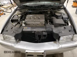2000 Cadillac Eldorado Touring ETC z VIN 1G6ET1294YU180525, wystawiony jako Copart lot #89253455 z przebiegiem 102 230 mil mil oraz Nie do naprawy • Non repairable. Historia ofert i sprzedaży dostępna na DreamBid. Obrazek 12.