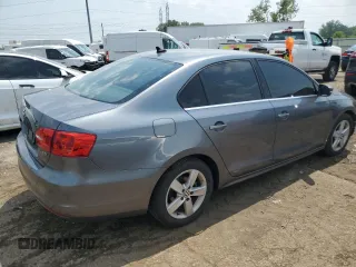 2013 Volkswagen Jetta TDI w/Premium with VIN 3VWLL7AJ6DM440499, listed as a Copart auction lot 60189355 with 148,786 mi miles and Clean title. Bid and sale history available at DreamBid. Image 3.