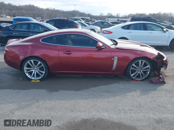 2008 Jaguar XK with VIN SAJWA43C089B22700, listed as a IAAI auction lot 41585734 with 67,946 mi miles. Bid and sale history available at carsss.com. Image 13.