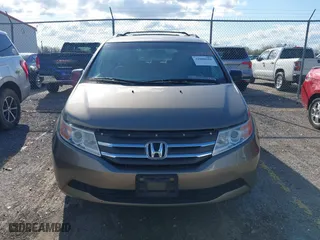 2012 Honda Odyssey LX with VIN 5FNRL5H29CB091860, listed as a IAAI auction lot 42000688 with 295,551 mi miles. Bid and sale history available at carsss.com. Image 12.