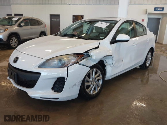2012 Mazda Mazda3 i Touring with VIN JM1BL1V72C1663712, listed as a IAAI auction lot 41564773 with 181,151 mi miles. Bid and sale history available at carsss.com. Image 2.