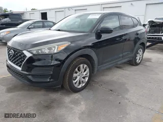 2019 Hyundai Tucson SE with VIN KM8J23A40KU874423, listed as a IAAI auction lot 41858253 with 136,651 mi miles. Bid and sale history available at carsss.com. Image 18.