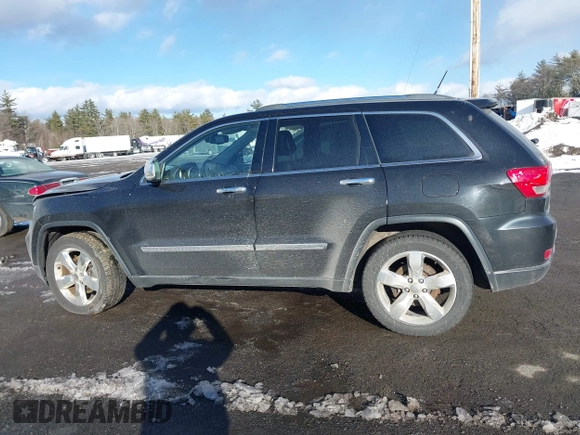 2013 Jeep Grand Cherokee Overland with VIN 1C4RJFCT3DC636378, listed as a IAAI auction lot 41477415 with 147,651 mi miles. Bid and sale history available at carsss.com. Image 14.