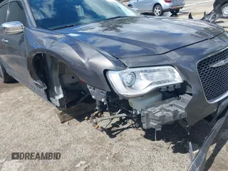 2016 Chrysler 300 with VIN 2C3CCAEG3GH324716, listed as a IAAI auction lot 41776116 with 134,978 mi miles. Bid and sale history available at carsss.com. Image 22.