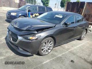 2021 Mazda 3 Select with VIN JM1BPABL0M1330769, listed as a Copart auction lot 61228365 with 96,101 mi miles and Salvage title. Bid and sale history available at DreamBid. Image 1.