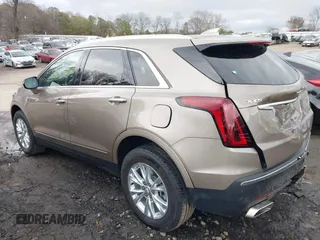 2023 Cadillac XT5 FWD Luxury z VIN 1GYKNAR45PZ140440, wystawiony jako IAAI lot #41723317 z przebiegiem 25 124 mil mil oraz . Historia ofert i sprzedaży dostępna na DreamBid. Obrazek 14.