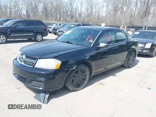 2013 Dodge Avenger SE with VIN 1C3CDZABXDN540331, listed as a IAAI auction lot 41889003 with 163,006 mi miles. Bid and sale history available at carsss.com. Image 2.