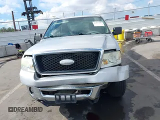 2007 Ford F-150 STX with VIN 1FTRX14W87KC40659, listed as a IAAI auction lot 41423345 with 145,811 mi miles. Bid and sale history available at carsss.com. Image 12.