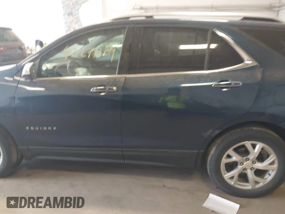 2019 Chevrolet Equinox Premier z VIN 2GNAXXEV9K6265112, wystawiony jako IAAI lot #42277109 z przebiegiem 64 261 mil mil oraz . Historia ofert i sprzedaży dostępna na DreamBid. Obrazek 13.