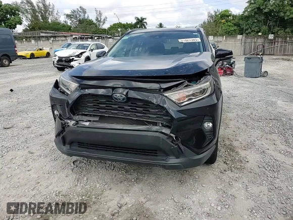 2019 Toyota RAV4 Hybrid XLE with VIN JTMRWRFV3KD020929, listed as a Copart auction lot 51827345 with 79,991 mi miles and Non Repairable. Bid and sale history available at carsss.com. Image 12.