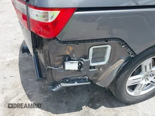 2013 Honda Odyssey Touring with VIN 5FNRL5H96DB068843, listed as a IAAI auction lot 42312176 with 115,804 mi miles and . Bid and sale history available at DreamBid. Image 19.