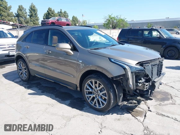 2020 Cadillac XT4 FWD Sport with VIN 1GYFZER4XLF032646, listed as a IAAI auction lot 42078928 with 11,987 mi miles and . Bid and sale history available at DreamBid. Image 1.