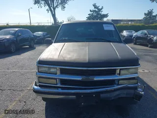 1999 Chevrolet Tahoe with VIN 1GNEC13R8XJ527499, listed as a IAAI auction lot 41880157 with 186,342 mi miles. Bid and sale history available at carsss.com. Image 12.