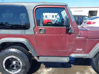2003 Jeep Wrangler Sport with VIN 1J4FA49S33P345192, listed as a IAAI auction lot 41801344 with 196,472 mi miles. Bid and sale history available at carsss.com. Image 13.