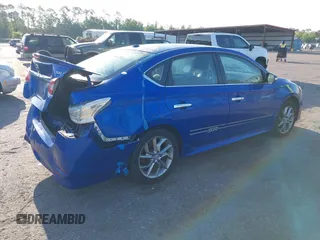 2015 Nissan Sentra S with VIN 3N1AB7AP9FY266606, listed as a IAAI auction lot 41983060 with 105,317 mi miles. Bid and sale history available at carsss.com. Image 4.