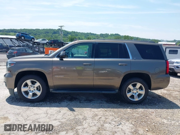 2016 Chevrolet Tahoe LT z VIN 1GNSCBKC8GR210829, wystawiony jako IAAI lot #42459936 z przebiegiem 160 518 mil mil oraz . Historia ofert i sprzedaży dostępna na DreamBid. Obrazek 15.