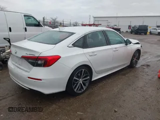2023 Honda Civic Touring z VIN 2HGFE1F93PH304731, wystawiony jako IAAI lot #41675935 z przebiegiem 27 435 mil mil oraz . Historia ofert i sprzedaży dostępna na DreamBid. Obrazek 4.