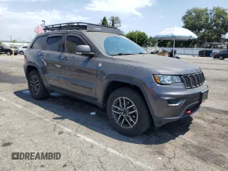 2019 Jeep Grand Cherokee Trailhawk z VIN 1C4RJFLG6KC759527, wystawiony jako Copart lot #64862645 z przebiegiem 76 079 mil mil oraz Szkoda całkowita • Salvage title. Historia ofert i sprzedaży dostępna na DreamBid. Obrazek 4.