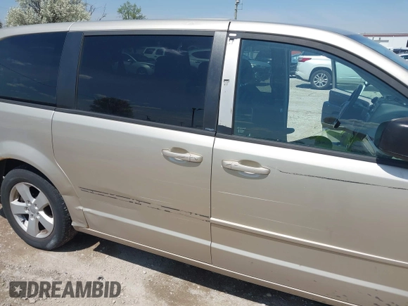 2013 Dodge Grand Caravan SE with VIN 2C4RDGBG9DR642162, listed as a IAAI auction lot 42113378 with 182,370 mi miles and . Bid and sale history available at DreamBid. Image 6.