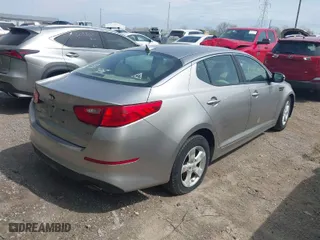 2014 Kia Optima LX with VIN KNAGM4A71E5493247, listed as a IAAI auction lot 42035797 with 153,811 mi miles. Bid and sale history available at carsss.com. Image 4.