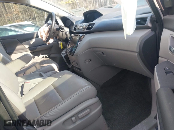 2016 Honda Odyssey Touring Elite with VIN 5FNRL5H92GB018560, listed as a IAAI auction lot 41796605 with 83,234 mi miles and . Bid and sale history available at carsss.com. Image 5.