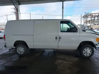 2005 Ford Econoline Cargo with VIN 1FTNE24L25HA10061, listed as a IAAI auction lot 41566517 with 247,777 mi miles and . Bid and sale history available at DreamBid. Image 13.