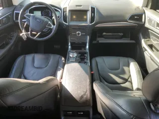 2019 Ford Edge Titanium z VIN 2FMPK3K96KBC31844, wystawiony jako Copart lot #85897344 z przebiegiem 59 421 mil mil oraz Szkoda całkowita • Salvage title. Historia ofert i sprzedaży dostępna na DreamBid. Obrazek 8.