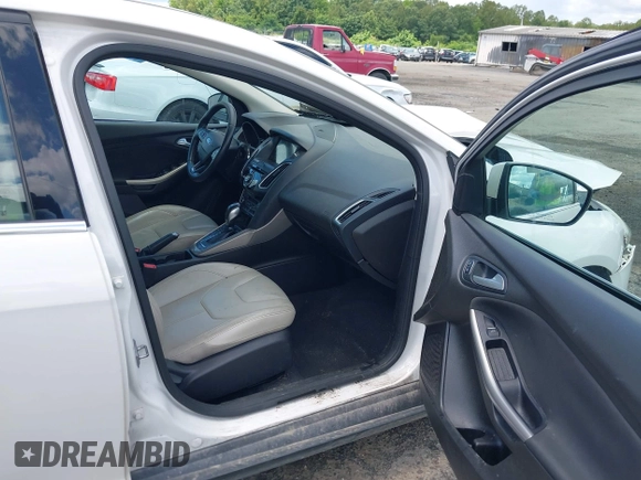 2016 Ford Focus Titanium with VIN 1FADP3N21GL309340, listed as a IAAI auction lot 42518653 with 101,555 mi miles and . Bid and sale history available at DreamBid. Image 5.