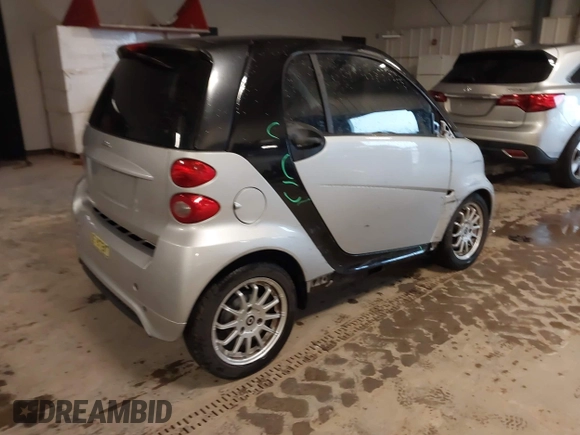 2014 Smart fortwo Pure with VIN WMEEJ3BA1EK728739, listed as a IAAI auction lot 41911785 with 120,688 mi miles and . Bid and sale history available at DreamBid. Image 4.