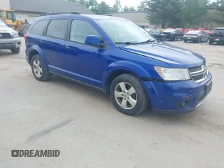 2012 Dodge Journey SXT z VIN 3C4PDDBG7CT285677, wystawiony jako IAAI lot #42374030 z przebiegiem 207 085 mil mil oraz . Historia ofert i sprzedaży dostępna na DreamBid. Obrazek 1.