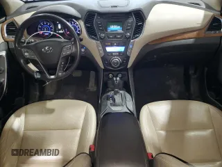 2016 Hyundai Santa Fe Premium z VIN KM8SNDHF6GU144631, wystawiony jako Copart lot #62164255 z przebiegiem 123 484 mil mil oraz Czysty tytuł • Clean title. Historia ofert i sprzedaży dostępna na DreamBid. Obrazek 8.