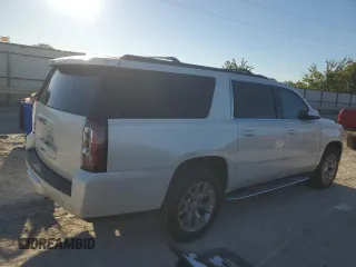 2015 GMC Yukon XL SLT with VIN 1GKS1HKC6FR166415, listed as a Copart auction lot 73029014 with 105,209 mi miles and Salvage Title. Bid and sale history available at carsss.com. Image 3.