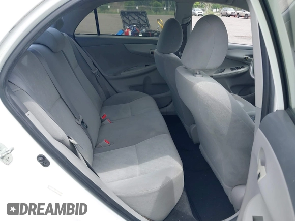 2009 Toyota Corolla with VIN 1NXBU40E09Z126070, listed as a IAAI auction lot 42196014 with 165,131 mi miles and . Bid and sale history available at DreamBid. Image 8.