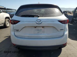 2017 Mazda CX-5 Grand Touring with VIN JM3KFBDL7H0202831, listed as a Copart auction lot 54943115 with 69,933 mi miles and Salvage Title. Bid and sale history available at carsss.com. Image 6.