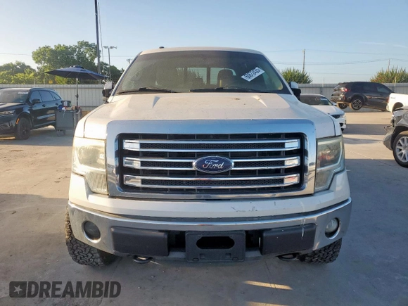2014 Ford F-150 XL with VIN 1FTFW1EF0EKF18679, listed as a Copart auction lot 60872435 with 128,203 mi miles and Salvage title. Bid and sale history available at DreamBid. Image 5.
