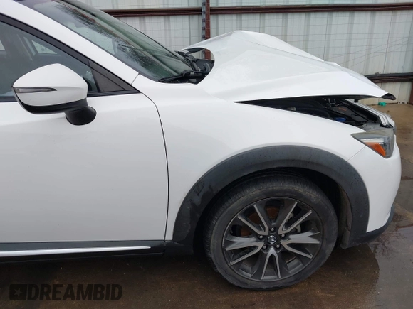 2016 Mazda CX-3 Grand Touring with VIN JM1DKBD73G0124742, listed as a IAAI auction lot 41448684 with 96,322 mi miles. Bid and sale history available at carsss.com. Image 18.