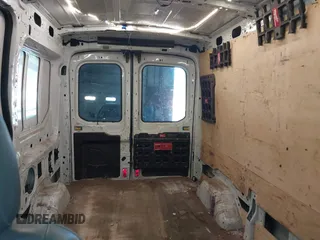 2016 Ford Transit Cargo с VIN 1FTYR1CM8GKA27958, выставлен на аукционе IAAI как лот 40308535 с пробегом 106 352 миль миль и . История ставок и продаж доступна на DreamBid. Изображение 8.
