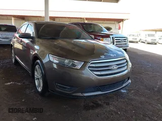 2015 Ford Taurus SEL with VIN 1FAHP2H87FG176103, listed as a IAAI auction lot 41950844 with 205,014 mi miles. Bid and sale history available at carsss.com. Image 1.