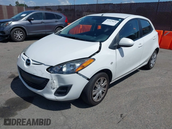 2014 Mazda 2 Sport with VIN JM1DE1KZ5E0171550, listed as a IAAI auction lot 41957824 with 70,838 mi miles and . Bid and sale history available at DreamBid. Image 2.