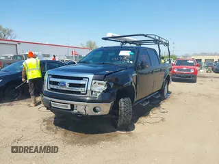 2014 Ford F-150 XL with VIN 1FTFW1EF0EFC98677, listed as a IAAI auction lot 41762191 with 212,626 mi miles. Bid and sale history available at carsss.com. Image 2.