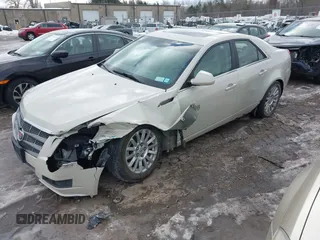 2010 Cadillac CTS Luxury with VIN 1G6DG5EG2A0109533, listed as a IAAI auction lot 41659590 with 110,749 mi miles and . Bid and sale history available at DreamBid. Image 2.