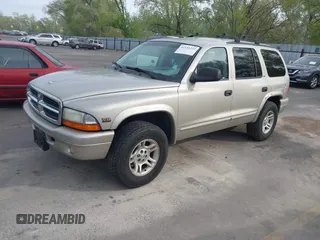 2002 Dodge Durango SLT z VIN 1B4HS48N72F138622, wystawiony jako IAAI lot #42111252 z przebiegiem 150 653 mil mil oraz . Historia ofert i sprzedaży dostępna na DreamBid. Obrazek 2.